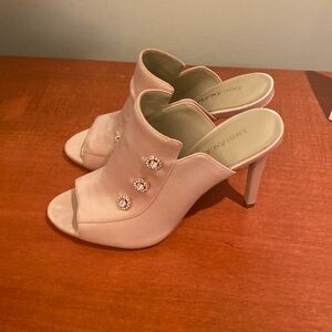 Selling designer shoes size 6..brand new, never worn